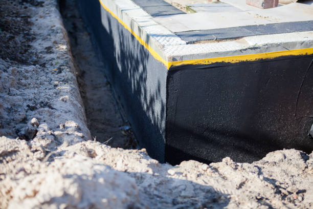 Professional Waterproofing technician working in Bridgewater, VA